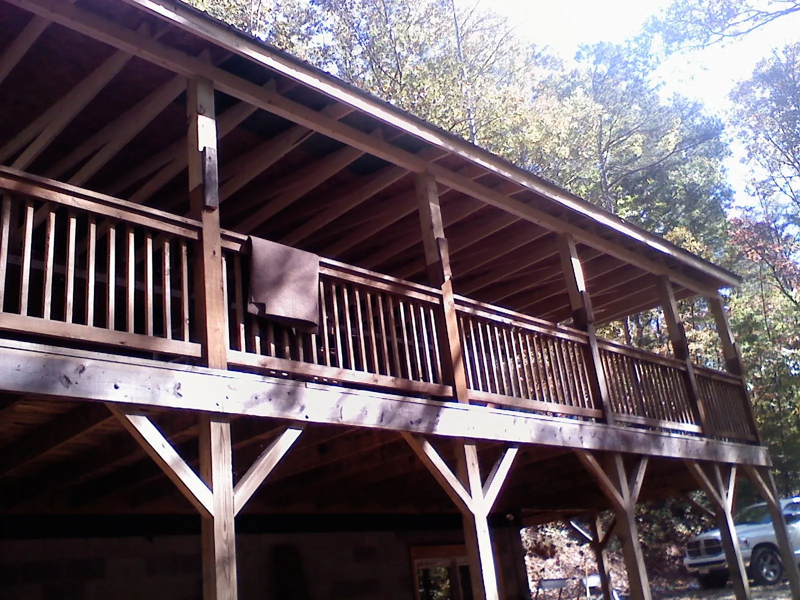 Timber framing under a new elevated porch and deck — Roof Leak Repair in West Babylon by Roofing Brothers